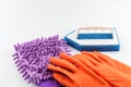 Violet Microfiber Cleaner Glove, brush and rubber gloves for cleaning Royalty Free Stock Photo