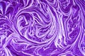 Violet mixed paint abstract background. Purple and gold marble pattern. Royalty Free Stock Photo