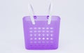 Violet plastic basket with white handles.