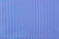 Violet pleated transparent caprone cloth as background texture