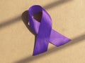 Violet or purple ribbon. Medical awareness concept