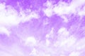 Violet purple sky with white cirro cumulus clouds