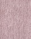 Violet relief plaster on wall closeup Royalty Free Stock Photo