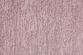 Violet relief plaster on wall closeup Royalty Free Stock Photo