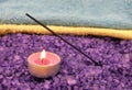 Violet salt with candle and insense stick