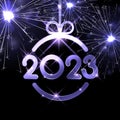 Violet 2023 sign in hanging christmas bauble with sparkling fireworks Royalty Free Stock Photo