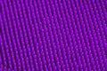 Violet silicone massage brash surface texture close up for background