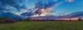 Violet sunset panorama. Spring sunset paintings. Ukrainian nature view