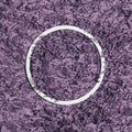 Violet wool background with white round frame. Minimal flat lay concept with copy space.