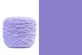 Violet wool ball on a white and violet background