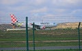 Violeta Airlines Behind A Fence