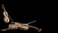 Violin with bow Classical orchestra musical instruments of orchestra closeup  isolated on black background Royalty Free Stock Photo
