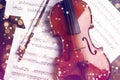 Violin, bow and note sheets on stone table, top view Royalty Free Stock Photo