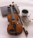 Violin and bow put beside White ceramic cup with black coffee Royalty Free Stock Photo