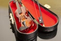violin with bow in red velvet case Royalty Free Stock Photo