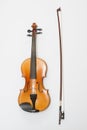 Violin and a bow on white background