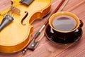 Violin and cup of coffee. Royalty Free Stock Photo