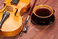 Violin and cup of coffee. Royalty Free Stock Photo