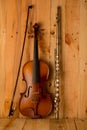 Violin and flute on wood background Royalty Free Stock Photo