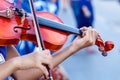 Violin,Hand on the strings of a violin. Royalty Free Stock Photo