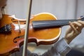 Violin lesson, correct hand position and bow, horizontal format