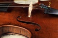 violin lies on top of the sheet music on the table Royalty Free Stock Photo