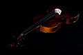 Violin orchestra musical instruments close up on black. Music background with violin Royalty Free Stock Photo