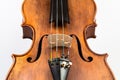 Violin music instrument on white focus on bridge Royalty Free Stock Photo