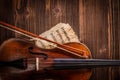 Violin and musical sheets detail with bow Royalty Free Stock Photo
