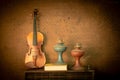 Violin and old lamp in vintage style Royalty Free Stock Photo