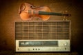 Violin and old radio in vintage style Royalty Free Stock Photo