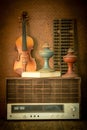 Violin and old radio in vintage style Royalty Free Stock Photo