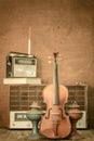 Violin and old radio in vintage style Royalty Free Stock Photo