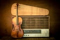 Violin and old radio in vintage style Royalty Free Stock Photo