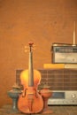 Violin and old radio in vintage style Royalty Free Stock Photo