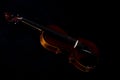 Violin orchestra musical instruments close up on black. Music background with violin Royalty Free Stock Photo