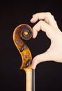 Violin peg box (Violin and hand forming a heart)