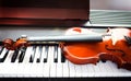 Violin and piano keyboard Royalty Free Stock Photo