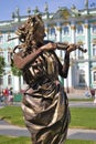 Violin player. Hermitage museum background.