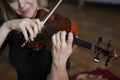 Violin player violinist classical music playing. Orchestra musical instruments Royalty Free Stock Photo
