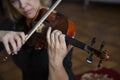 Violin player violinist classical music playing. Orchestra musical instruments Royalty Free Stock Photo