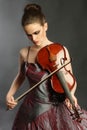 Violin playing beautiful woman violinist