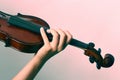 Violin playing with hand Royalty Free Stock Photo