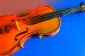 Violin on a red blue background