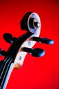 Violin Scroll Isolated on Red Royalty Free Stock Photo