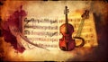 Violin and sheet music score book background with an abstract vintage distressed retro texture Royalty Free Stock Photo