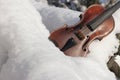 Violin on snow - theme motive Christmas, Xmas, advent. Concept background for music, instrument, winter Royalty Free Stock Photo