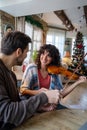 Violin teacher helping a woman student at home Royalty Free Stock Photo