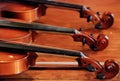 Violin in vintage style on wood background Royalty Free Stock Photo