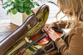 Violinist adjusts neck of violin lying in case Royalty Free Stock Photo